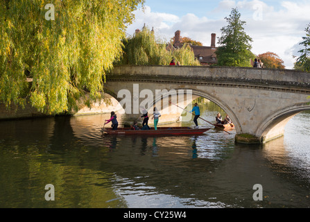 Punts on river Cam at Trinity Church bridge, Trinity College Cambridge, with punting in front on the river Cam, UK. Stock Photo