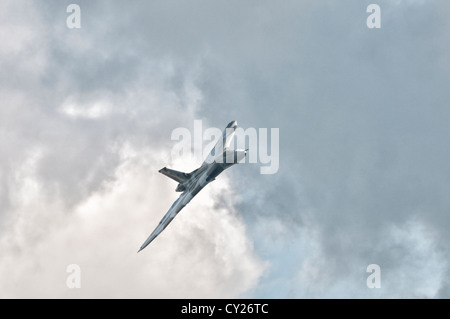 British Cold War Nuclear Bomber the Delta Winged AVRO Vulcan XH558 turning overhead Fairford at the 2012 RIAT Stock Photo