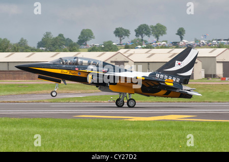 A Korean T-50B Golden Eagle Military Jet Trainer from the Black Eagles aerobatic display team touches down at the 2012 RIAT Stock Photo