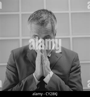 black and white business man frustration stressed businessman License free except ads and outdoor billboards Stock Photo
