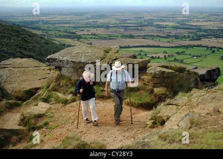 Husband and wife hiking at the Wainstones, cleveland hills. Stock Photo