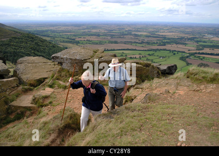 Husband and wife hiking at the Wainstones, cleveland hills. Stock Photo