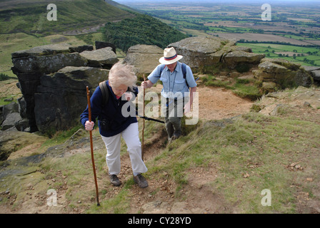 Husband and wife hiking at the Wainstones, cleveland hills. Stock Photo