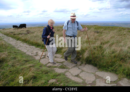 Husband and wife hiking at the Wainstones, cleveland hills. Stock Photo