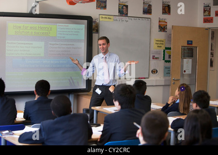 Teacher takes a class at Pimlico Academy, a modern secondary school providing aspirational education in London, UK. Stock Photo