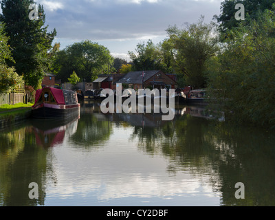 Narrowboats tied up on the Grand Union Canal at Blisworth, Northamptonshire. Stock Photo