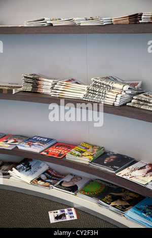 Free Reading Material at Skyteam Executive Lounge on Terminal Four in Heathrow - London UK Stock Photo