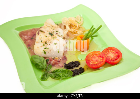 Hake in cranberry sauce with caviar and basil Stock Photo