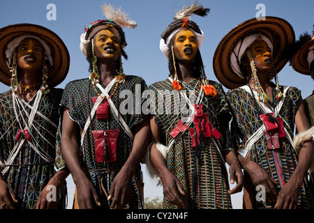 Men from the Wodaabe Tuareg tribe are dancing the gerewol dance at the ...