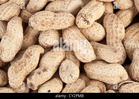 Background made of roasted peanuts in a pile Stock Photo