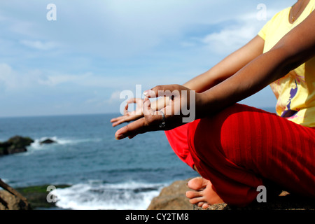 Fingers in meditative poture Stock Photo