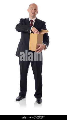 Businessmen in black suit Open blank brown paper box isolated on white Stock Photo