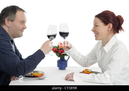 Dining man and woman couple clinking with glass of wine Stock Photo