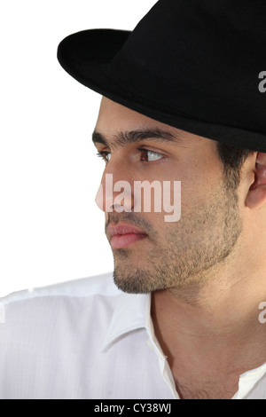 Trendy young man wearing a hat Stock Photo