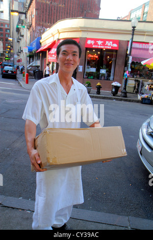 Boston Massachusetts,Chinatown,Beach Street,Asian man men male adult adults,restaurant restaurants food dining cafe cafes,worker,workers,box,MA1208211 Stock Photo