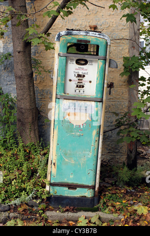 Vintage unrestored Dino gas pump Stock Photo