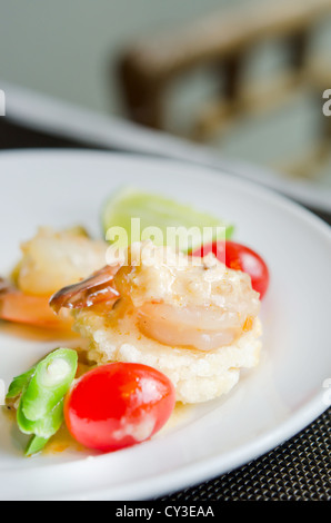 Crispy rice cake and shrimp dipping ( rice fried and shrimp sauce on top), Stock Photo