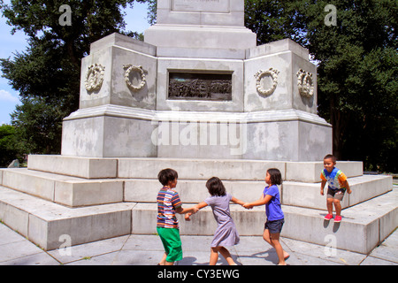 Boston Massachusetts,Boston Common,public park,Soldiers & Sailors Monument,memorial,Hispanic boy boys,male kid kids child children youngster,girl girl Stock Photo