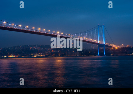 First Bosphorus Bridge (Boğaziçi Köprüsü) illuminated at night, Istanbul, Turkey Stock Photo
