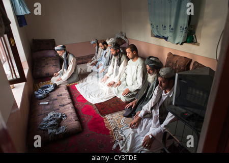 family members of victims who died in Kanam bloodbath where 12 people were killed by a warlord. Stock Photo