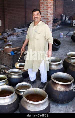 A portrait of Khan Mohammed Sharief Waza, a traditional Kashmiri chef at a Wazwan feast. Srinagar, Kashmir, India Stock Photo