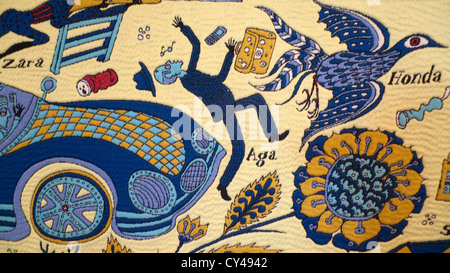 Grayson Perry Walthamstow Tapestry detail of man being hit by a car in exhibition of the work, London UK  KATHY DEWITT Stock Photo