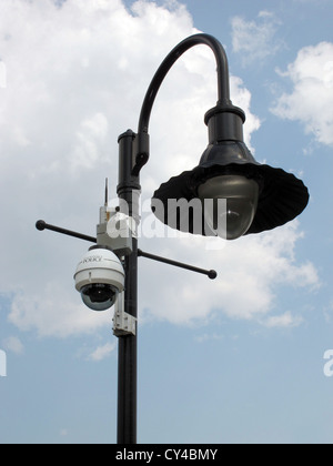 Police surveillance camera on light post. Stock Photo