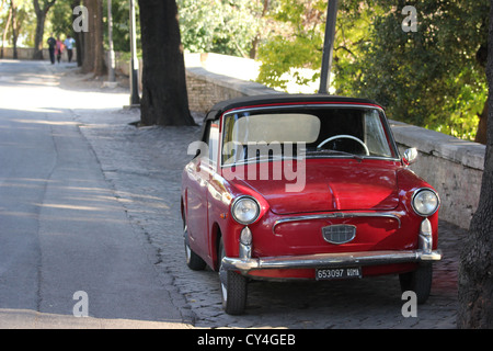 a beautiful picture of a fun romantic cabrio topolino red CAR, fiat 600, Roma, rome, Rome, Italy, photoarkive Stock Photo