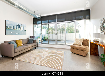Living room with sliding glass door to balcony - artwork from photographer portfolio Stock Photo