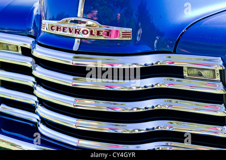 Front end detail of a 1952 Chevrolet custom panel truck shown at car show in Goleta, California Stock Photo