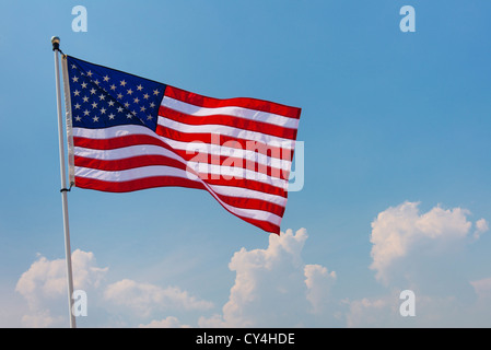 USA, New Jersey, Jersey City, US flag against blue sky Stock Photo