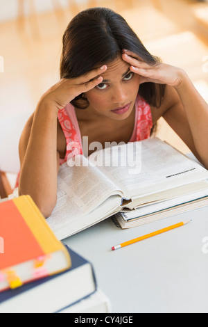 USA, New Jersey, Jersey City, Female student reading book Stock Photo