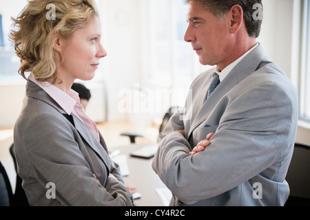 USA, New Jersey, Jersey City, Office workers discussing issues Stock Photo