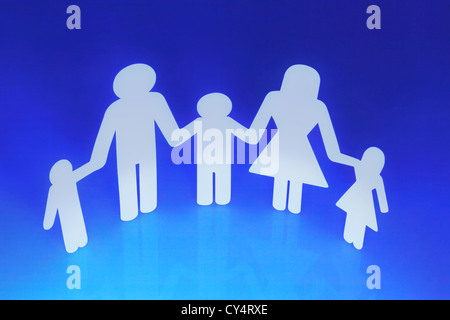 Paper doll family holding hands Stock Photo - Alamy