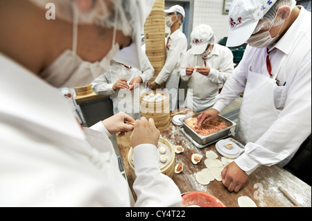 Xiao Lung Bao or Soup Dumplings, being prepared at the world famous Din Tai Fung in Taipei, Taiwan Stock Photo