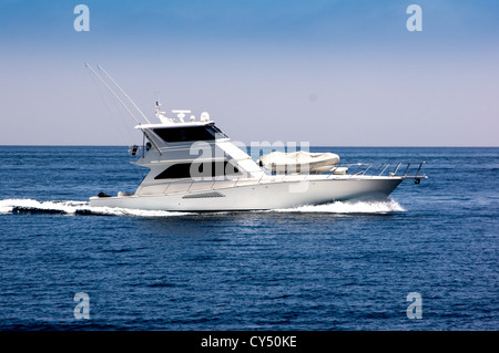 White sportfisher yacht underway. Stock Photo