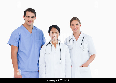 Smiling medical staff standing together Stock Photo