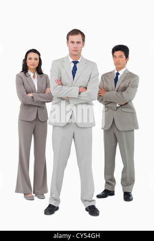 Serious young business team standing together Stock Photo