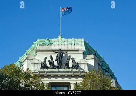 Australia House roof detail (above main entrance) showing sculpture and national flag Stock Photo
