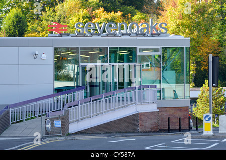 Sevenoaks train railway station entrance and sign with disabled access ramp combined with general access Kent England UK Stock Photo