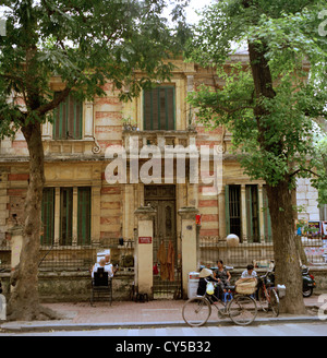 French Colonial traditional house in Hanoi in Vietnam in Far East Southeast Asia. Housing Tradition Street Scene Houses Building Architecture Travel Stock Photo