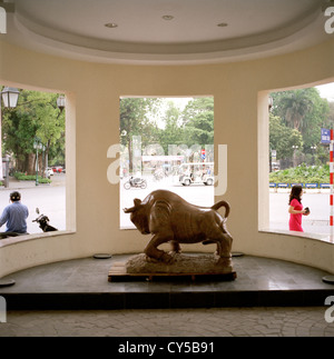 Hanoi Stock Exchange in city of Hanoi in Vietnam in Far East Southeast Asia. Money Bull Market Street Sculpture Modern Life Art Finance Travel Stock Photo