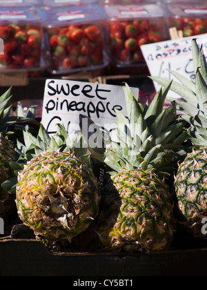 Pineapples for sale on a market stall at the Mercat St Josep La ...