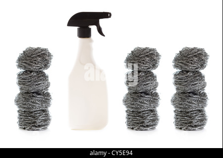 cleaning spray bottle and scouring pads isolated on a white background Stock Photo