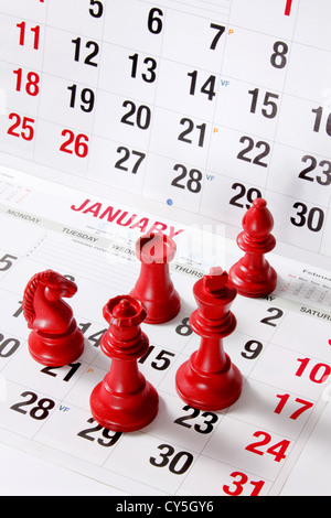 Chess Pieces on Calendar Stock Photo