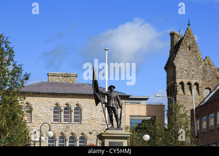 War memorial and former police barracks in an unusual castle-like building in Market Square Dungannon Tyrone Northern Ireland UK Stock Photo