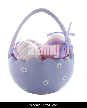 Purple Easter Eggs in a China Basket Isolated On White Stock Photo