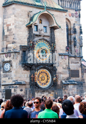 Crowd at Astronomical Clock Tower in Prague's Old Town Hall Square. Stock Photo