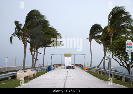 dark rain storm clouds blow over the seven-mile bridge marathon key florida keys usa old closed 7 mile bridge tropical storm approaching Stock Photo