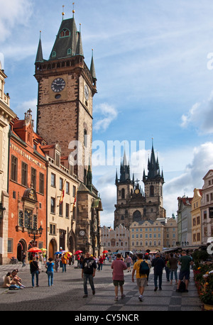 Prague's Old Town Square landmarks of Town Hall Tower at left and Tyn Church in rear Stock Photo